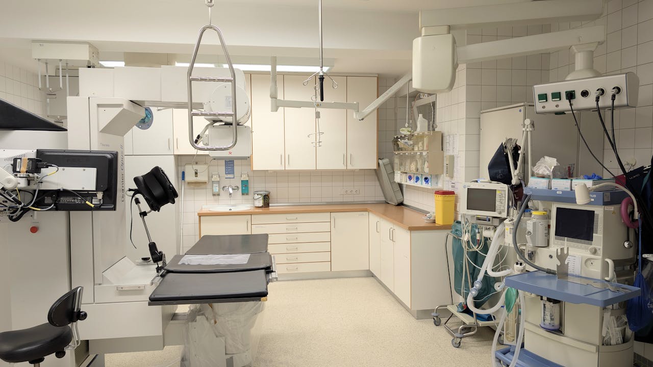 creative Spacious X-ray room equipped with advanced imaging technology in a hospital.